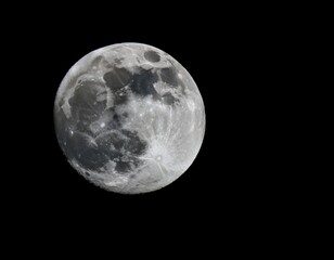 Obraz premium Full moon illuminating the night sky, representing lunar phases, astronomy, and nighttime beauty.