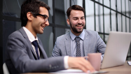 Business people discussing over new business project in office.