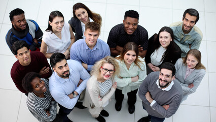 Top view of a group of business people looking up