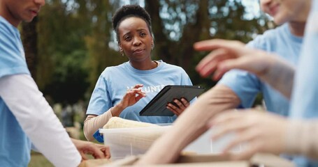 Woman, group and donation with food, outdoor and tablet at charity event, diversity or container for kindness. People, team and talking with app, help or solidarity for social responsibility in park