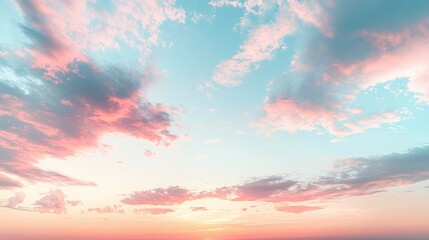 Obraz premium a peaceful sunset sky featuring a soft gradient of pastel colors blending pinks oranges and blues creating a serene tranquil evening scene and nature’s beauty