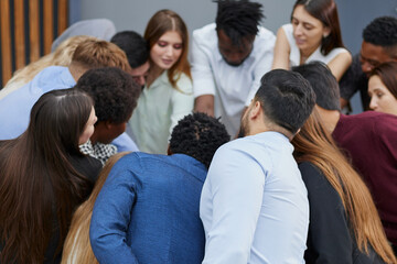 Narrow banner of multiracial people stack hands motivated for shared business success or goal...