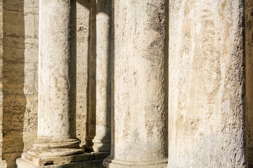 abstract architectural background - columns and walls made of light stone