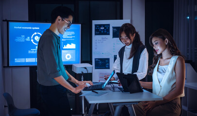 team of financial discussion budget planning, analyzing digital financial data and strategy in a modern office at night