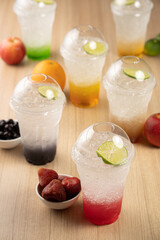 Colorful Sparkling Beverages on Wood Table