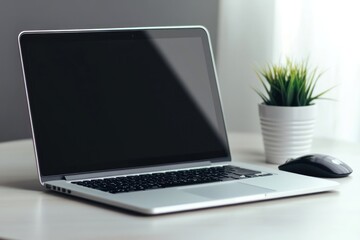 Fototapeta premium Laptop mockup laptop mouse plant.