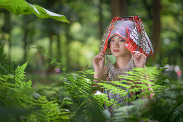 Beautiful portrait fashion of Akha hill tribe girls wearing traditional costumes with a modern...