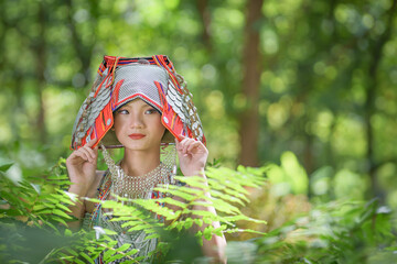 Beautiful portrait fashion of Akha hill tribe girls wearing traditional costumes with a modern...