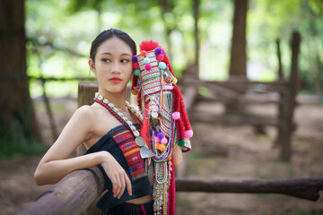 Beautiful portrait fashion of Akha hill tribe girls wearing traditional costumes with a modern...