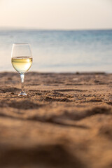 glass of wine at the sea. Selective focus.