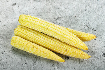 Raw sweet baby corn heap
