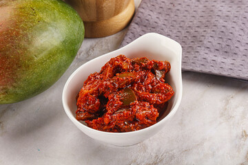 Spicy pickled raw green mango