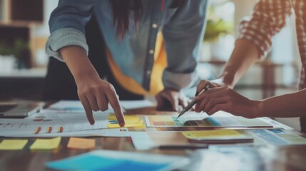 Close up ux developer and ui designer use augmented reality brainstorming about mobile app interface wireframe design on desk at modern office.Creative digital development agency