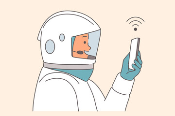 Man astronaut with smartphone explores outer space and takes selfies while traveling into orbit