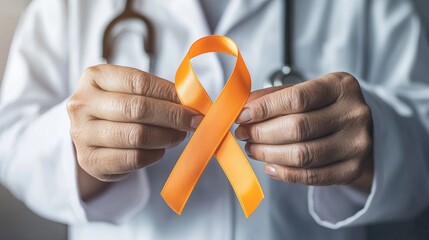 A doctor is holding an orange ribbon. This is part of a campaign to help people avoid getting skin cancer, especially a type called melanoma. December is a month when they focus on this.