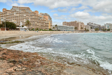 Breathtaking Aerial View of Calpe Spain Sandy Beach Azure Sea Dramatic Sky Summer Vacation European...