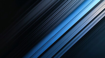 Obraz premium A soft, modern background features a diagonal pattern of blue and black shades. The gradient effect creates a subtle texture, like brushed metal, on a clean dark surface.