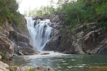 Naklejka premium Explore the stunning Belize Big Rock Waterfalls surrounded by lush nature and tranquility for a perfect outdoor adventure