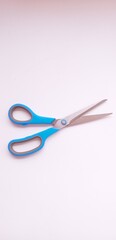 A pair of scissors with a white background
