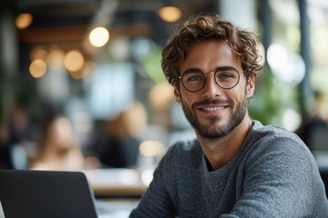 Happy entrepreneur using laptop while working in office and looking at camera, Generative AI