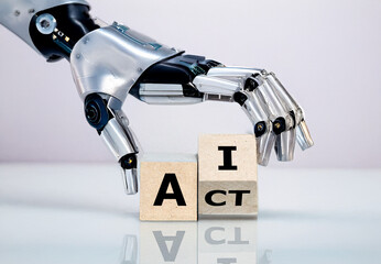 Cube form the expression 'ai act'. Symbol for the AI act of the European Union.