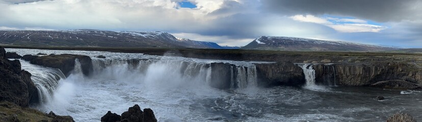 Goðafoss, Þingeyjarsveit, Iceland - panorama sightseeing waterfall location on overcast midsummer day without tourists