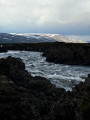 Goðafoss, Þingeyjarsveit, Iceland - strong contrasts rough waters at sightseeing waterfall location on midsummer day