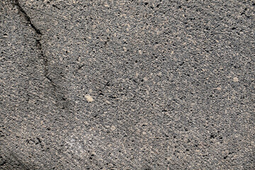 A high-resolution image showcasing the texture of rough concrete, ideal for backgrounds or design elements.