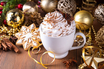 Hot chocolate, latte coffee or eggnog cocktail with whipped crea