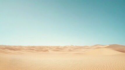 Fototapeta premium A wide view of a vast sandy desert with rippled dunes under a clear sky, perfect for text overlay. No people, copy space