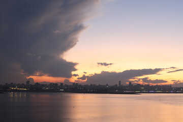 sunset over the city with. redness on the horizon