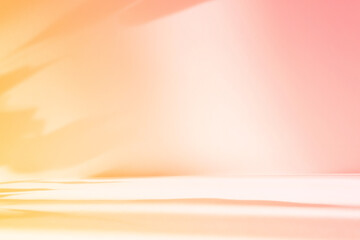 Abstract orange color gradient studio background for product presentation. Empty room with shadows of flowers and plant leaves. 3d pink room with copy space. Summer concept. Blurred backdrop