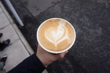 a cup of coffee with a white background. hot coffee in the cup.