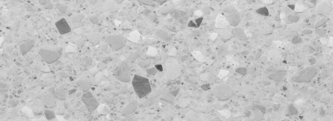 Abstract white and gray terrazzo flooring texture polished stone pattern old surface marble for background. Wall terrazzo texture gray and black of stone granite white background.	