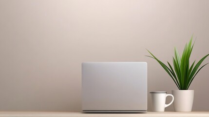 Fototapeta premium Modern Workspace with Laptop and Green Plant