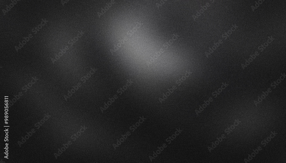 Poster subtle grainy texture on a black background with soft light emanating from the center