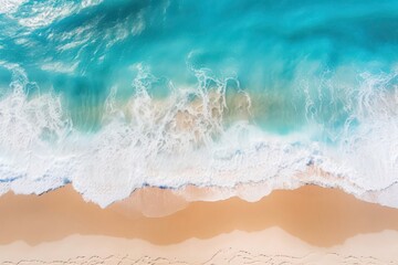 Obraz premium The ocean is calm and the waves are small. The beach is sandy and the water is blue, top view. Generative AI