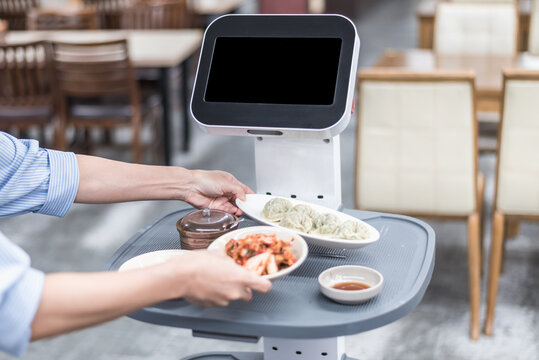 Human Interaction with Serving Robot in a Korean Restaurant