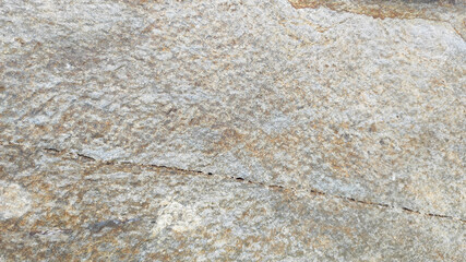 Natural stone texture with subtle earthy tones.