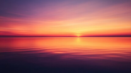 Fototapeta premium A vibrant horizon with a beautifully blurred sunset, merging soft orange, pink, and purple shades across the sky for a calm, serene atmosphere