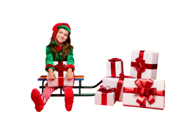 Nice attractive dreamy cheerful cheery funny pre-teen elf carrying holding fairy tradition purchase wish christmastime isolated over bright vivid shine red background