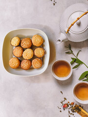 Pastries or cookies are enjoyed with warm tea in the morning. 