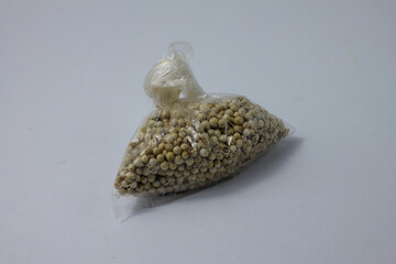 coriander in small plastic packaging