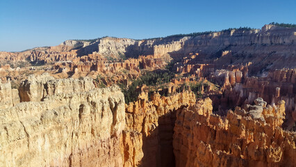 Golden hour illuminating Bryce Canyon's stunning landscape