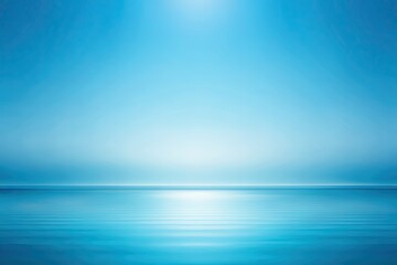 Obraz premium A serene, vast, and isolated plain blue background with a subtle gradient, ideal for product photography, branding, and visual designs requiring a calm atmosphere.