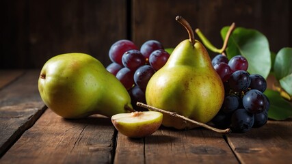 Pears and grapes on wooden surface background