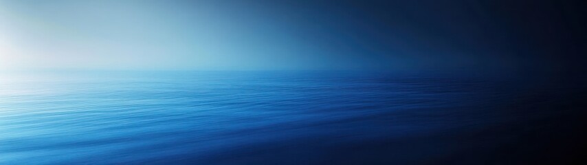 A serene ocean view with deep blue tones, evoking calm and tranquility.