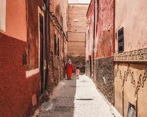 Woman and child in the streets of Marrakech, Morocco.