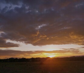 sunset over hills