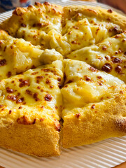 pizza with cheese and durian under bright light for eating